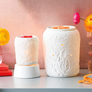 The mini warmer version of the much loved Love Wishes Scentsy Warmer with dandelion blooms being blown across it.  So pretty when lit.