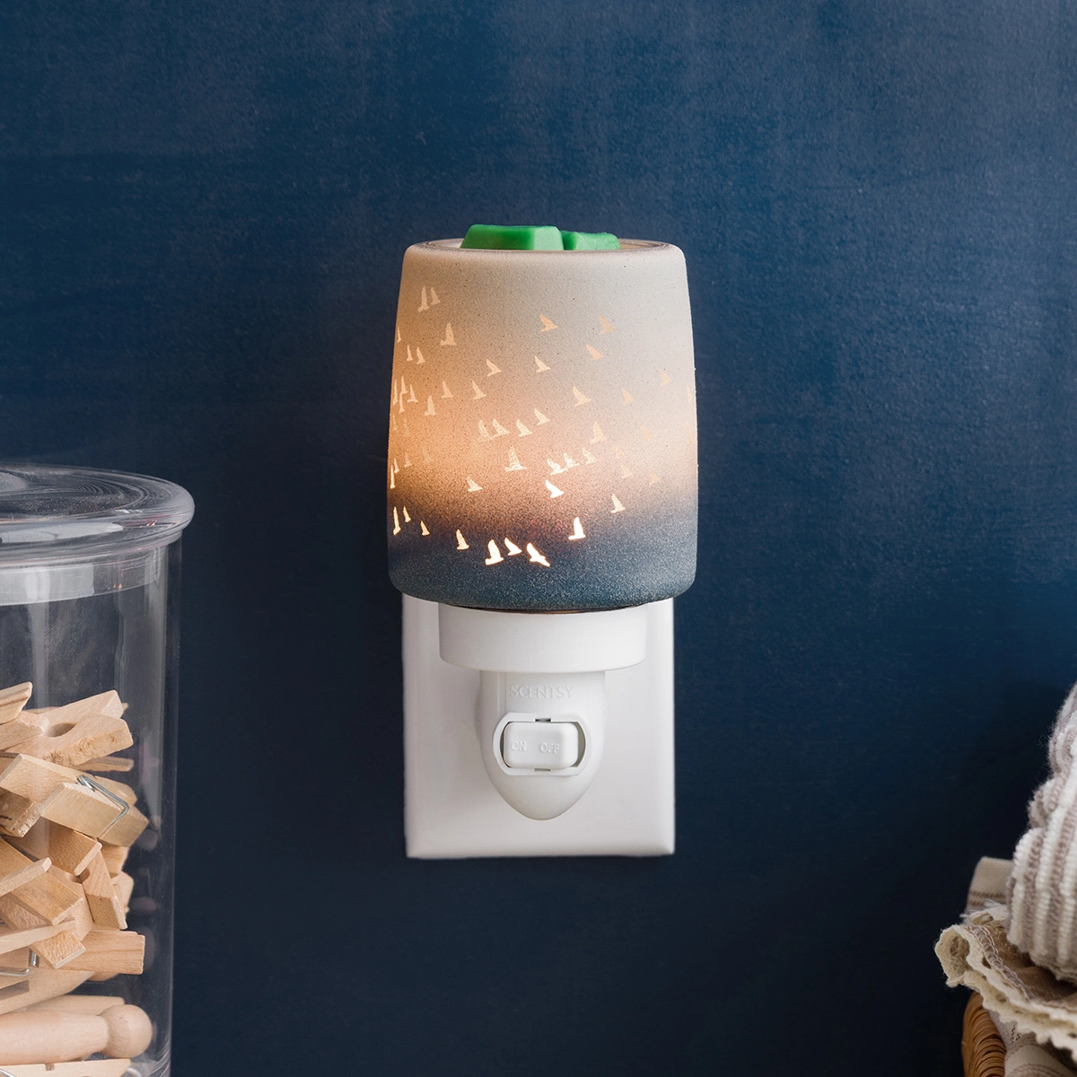 Are Wax Warmers Safer Than Candles? The Honest Answer 2026 Waves and Wings Scentsy plug-in mini wax warmer UK flameless home fragrance no fire risk no soot safer than candles for homes with children pets renters