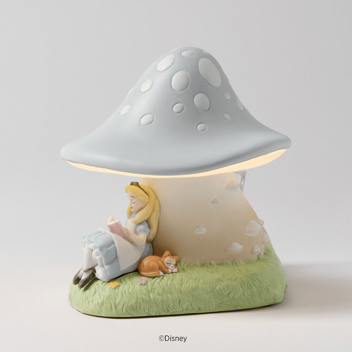 Disney Alice in Wonderland Down the Rabbit Hole Scentsy warmer UK Europe 2026 - mushroom warmer glowing with Alice reading underneath £153 / €185
