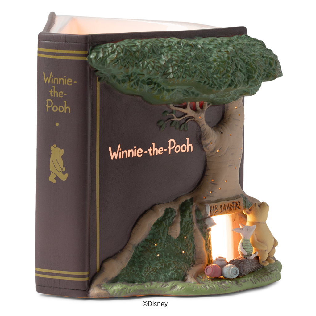 Winnie the Pooh Scentsy Collection: 100th Anniversary Launch 2026 Winnie the Pooh 100 Years of Friendship Scentsy Warmer lit, with light spilling from the open door